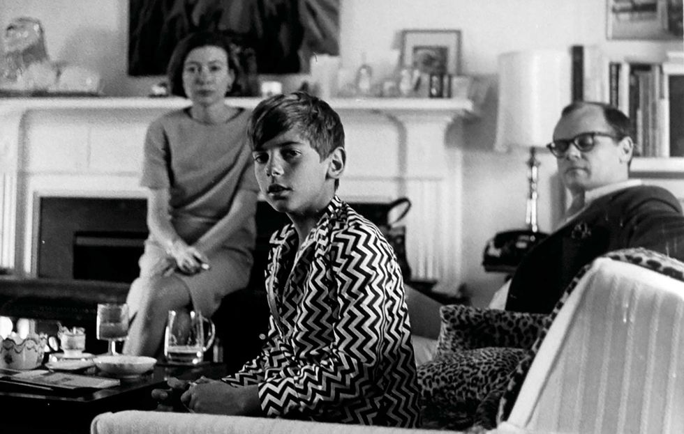 a young griffin dunne, with his aunt joan and uncle john at the home of his father, writer dominick dunne, in los angeles