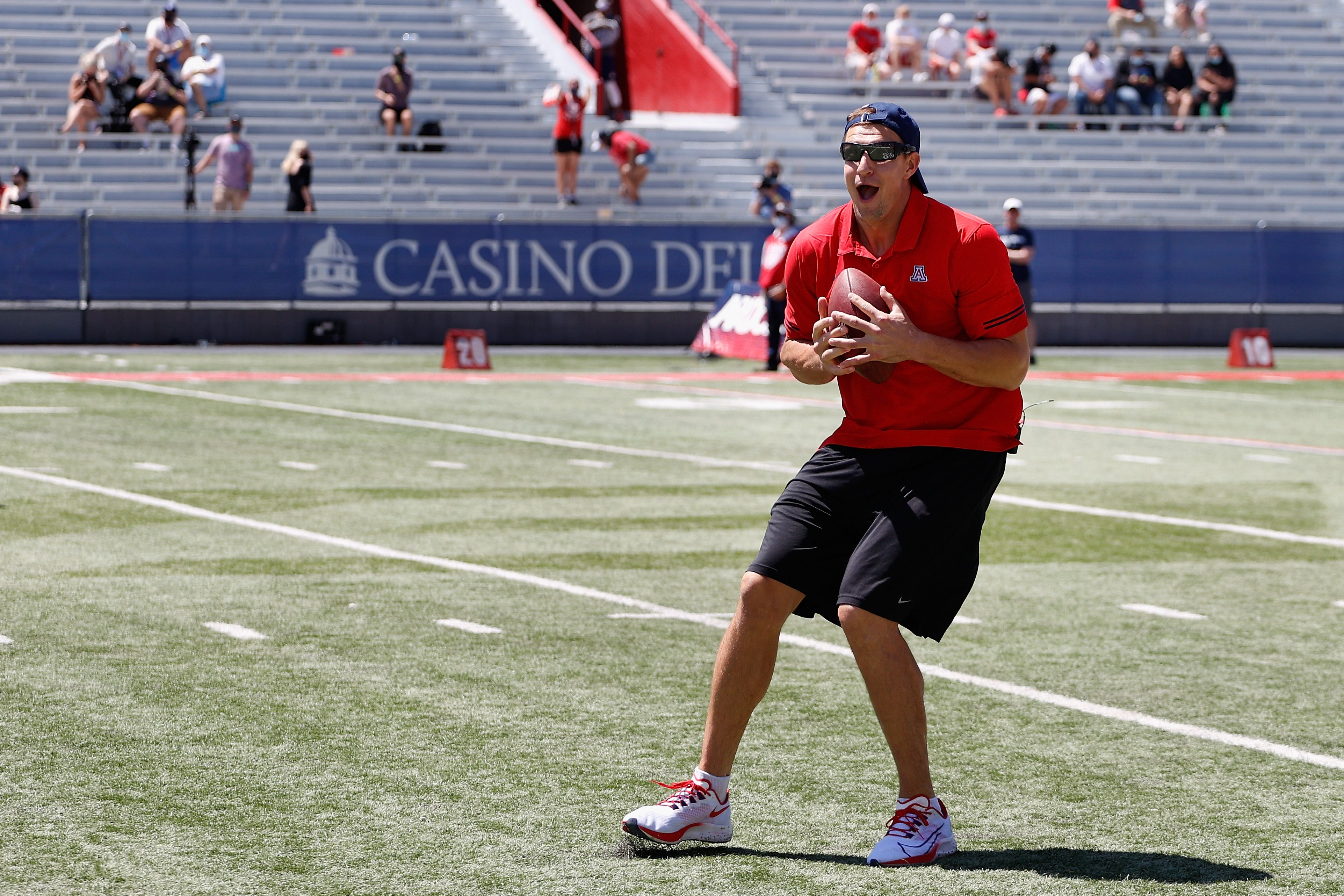 Bucs TE Rob Gronkowski catches football dropped from helicopter