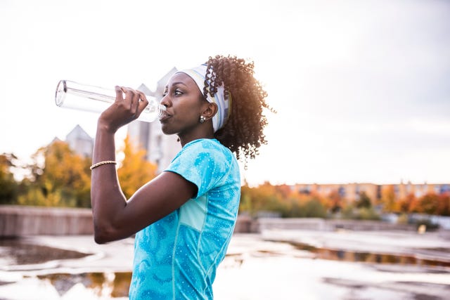 Athlete drinking water