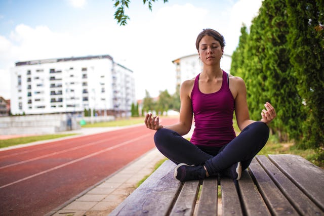 Athlete girl meditate