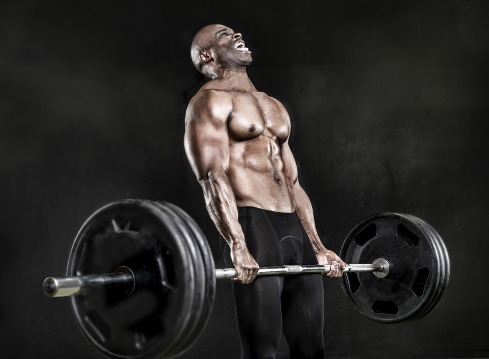 athlete lifting heavy weights