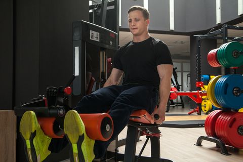 athlete man training in gym