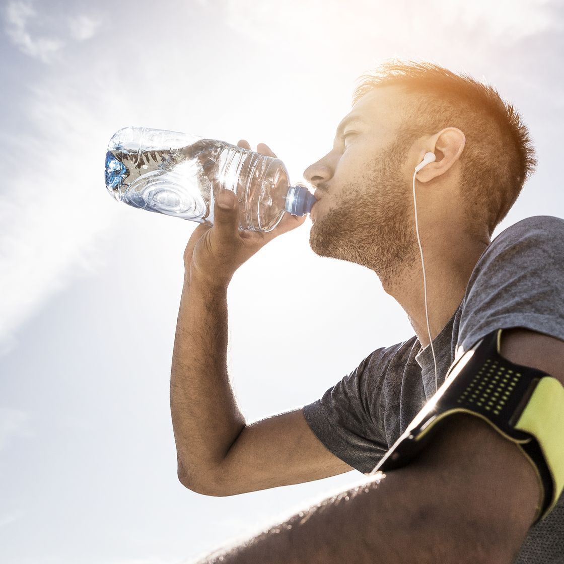 athlete resting and refreshing with water