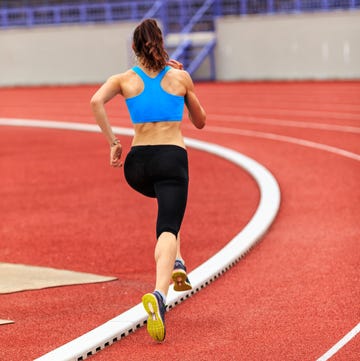 Athlete running at the stadium