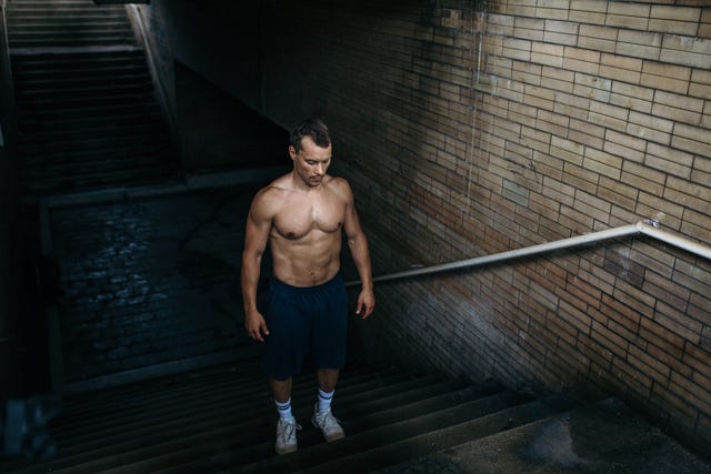 athlete standing in hallway