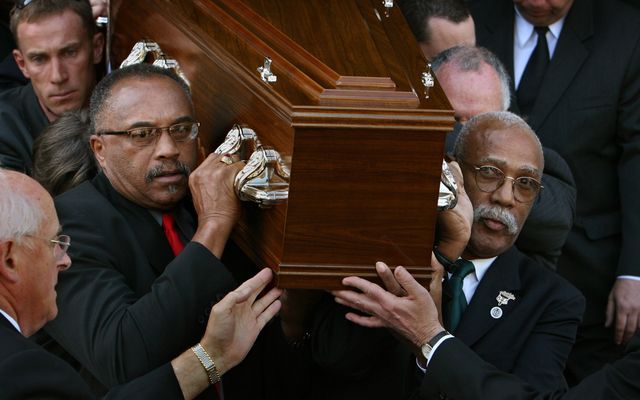 athletes tommie smith, left and john carlos carry peter norman's casket from t