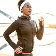 Athletic Woman Running Outdoors daylight savings time