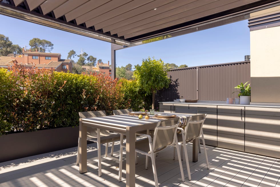 cocina exterior con comedor
