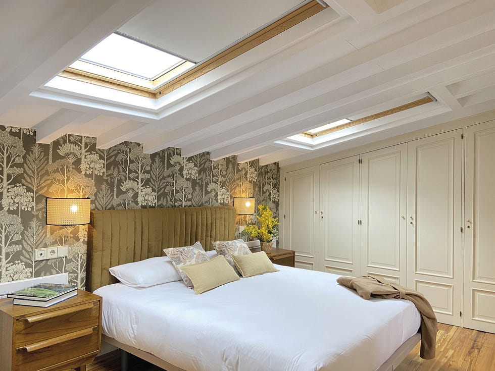 Ático en madrid con terraza dormitorio abuhardillado