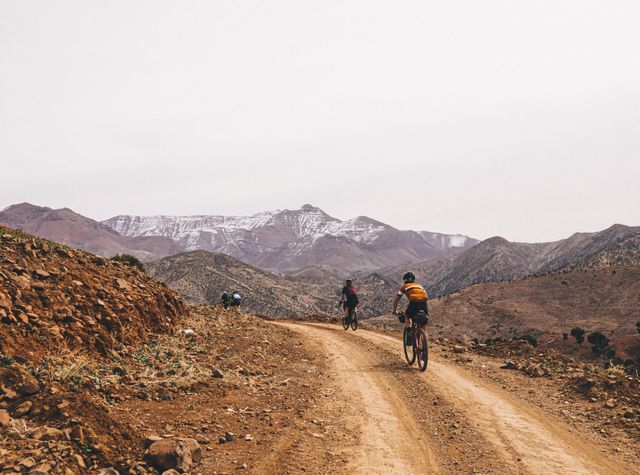 on day one, riders were initiated to the race with 17,000 feet of climbing over the high atlas mountains after the first 5,000 feet, we were greeted with views of the day's true challenge—the pass at telouet—in the distance  rider stephen fitzgerald