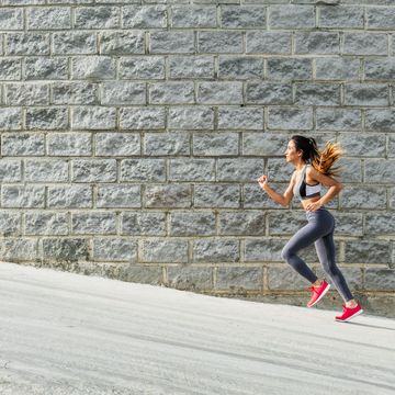 woman running up a slope