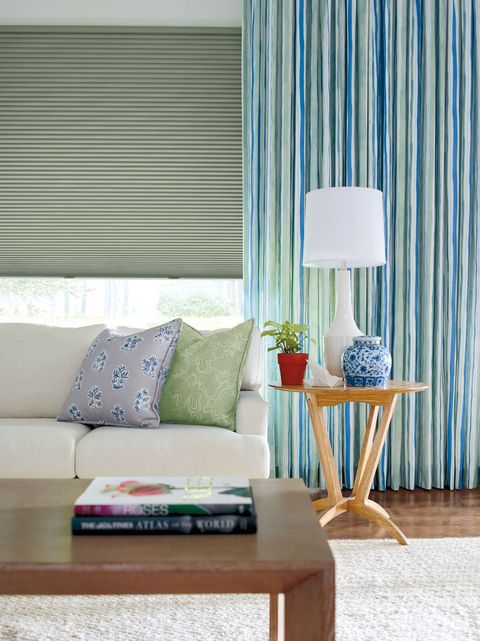 Interior design, Curtain, Window treatment, Furniture, Room, Living room, Window covering, Green, Blue, Yellow, 