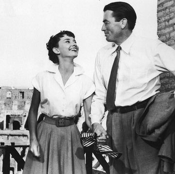 belgian born actor audrey hepburn 1929 1993 holds the hand of american actor gregory peck in a still from the film roman holiday, directed by william wyler, 1953 actor gregory peck died june 12, 2003 at age 87 of natural causes in his los angeles, california home photo by paramount picturescourtesy of getty images