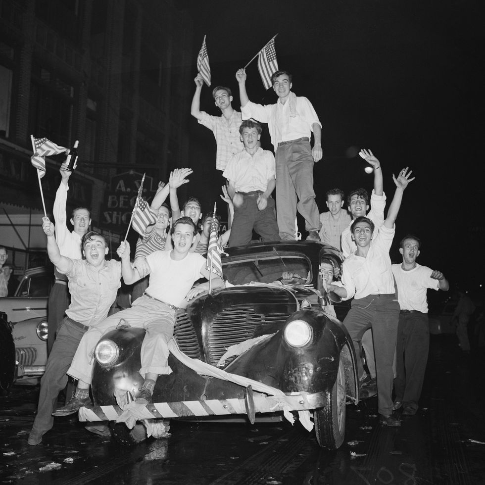 young men celebrating japan's surrender