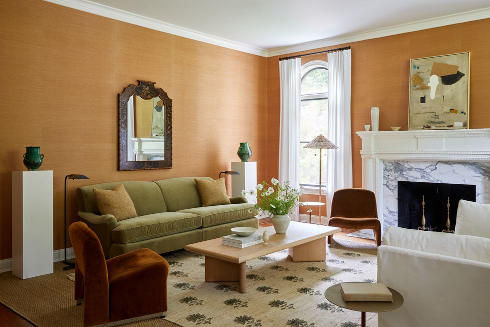 family room with ochre colored wallpaper