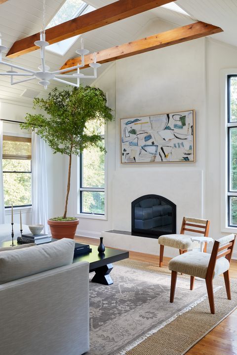 neutral living room with lofted ceilings
