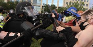 aurora, co   june 27 aurora police officers clash with a protesters with batons during the elijah mcclain protest at the aurora municipal center june 27, 2020 elijah mcclain died august 30, 2019 several days after a struggle with aurora police elijah became unconscious during the encounter with police august 24, 2019 and had a heart attack while being transported to a hospital mcclain died after being taken off life support photo by andy crossthe denver post