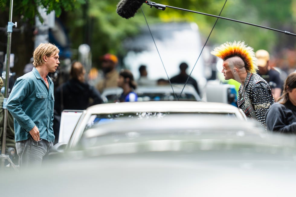 Austin Butler and Matt Smith with a brightly colored mohawk, filming Caught Stealing, New York