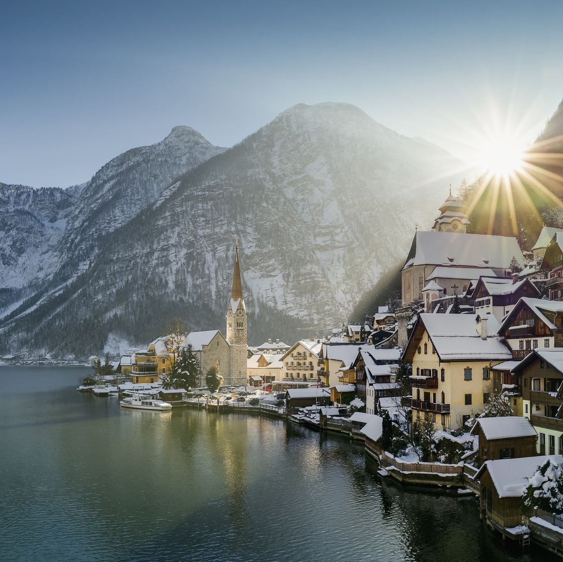 austria, salzkammergut, view of hallstatt and dachstein over lake hallstaetter see at sunrise in winter