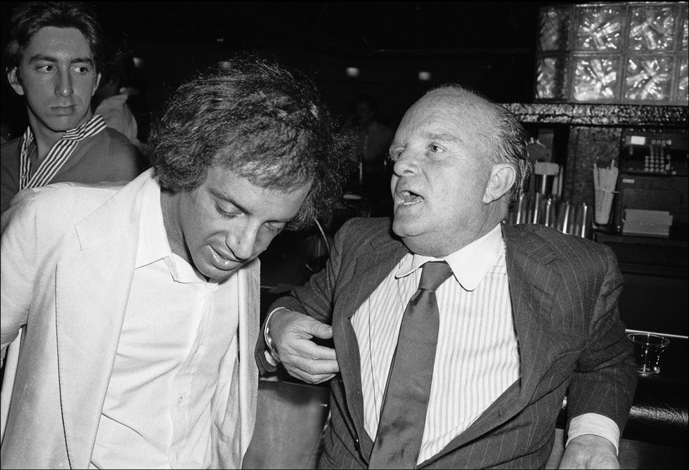 truman capote at the bar with steve rubell at studio 54