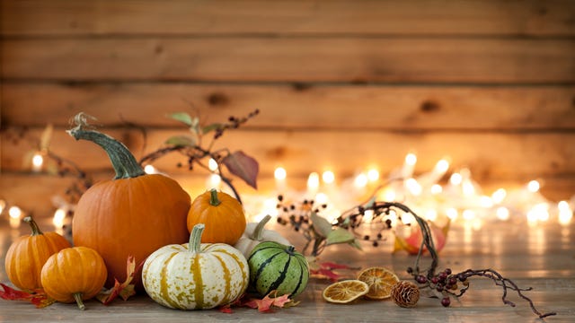 https://hips.hearstapps.com/hmg-prod/images/autumn-pumpkin-arrangement-on-a-wood-background-royalty-free-image-1663624949.jpg?crop=1.00xw:0.893xh;0,0.107xh&resize=640:*