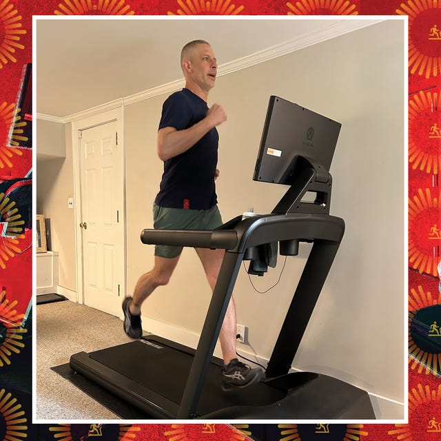 man running on a treadmill in an indoor setting