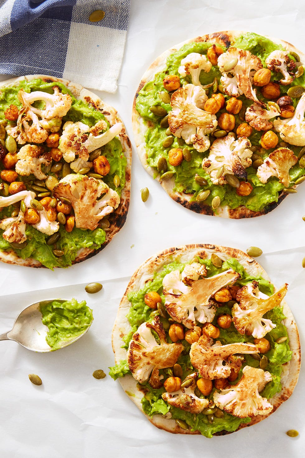 flatbread with avocado, cauliflower, and chickpeas