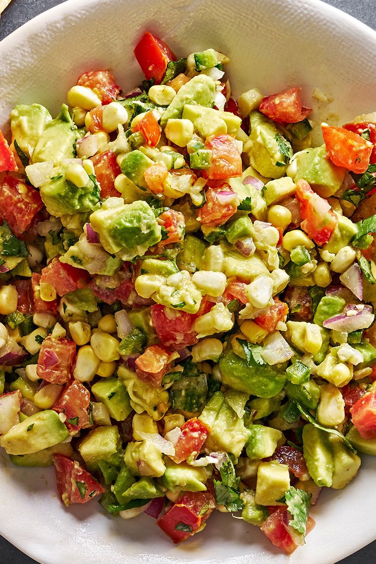diced avocado tossed with tomato, fresh corn, red onion, jalapeno, cilantro, and lime juice, served with tortilla chips