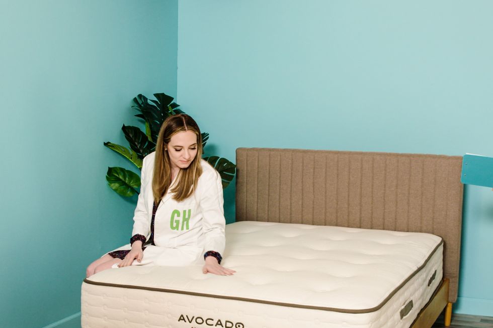 two people in lab coats testing the avocado mattress
