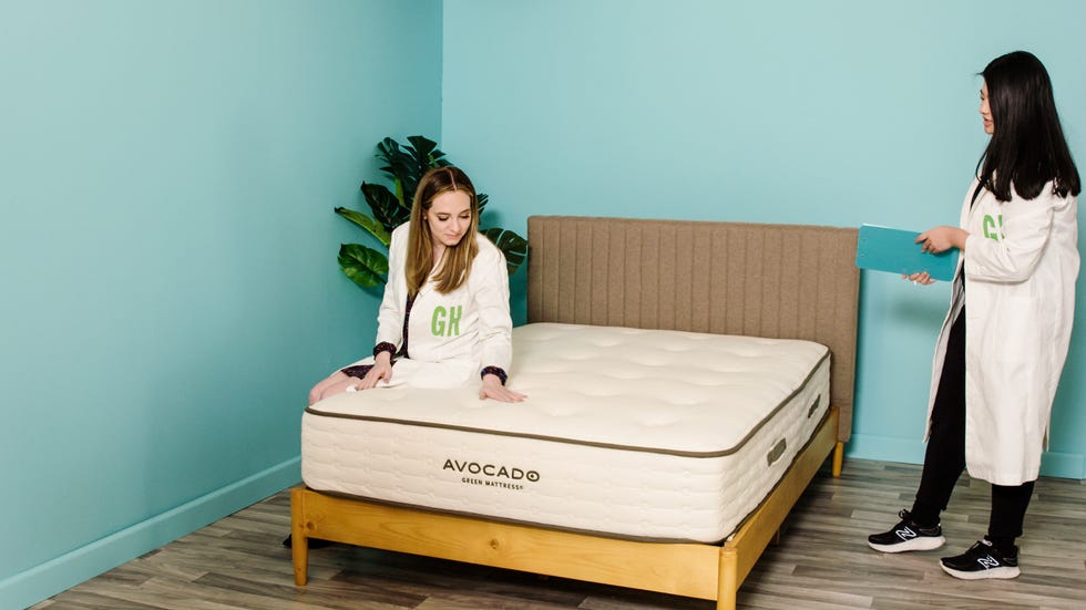 two people in lab coats testing the avocado mattress