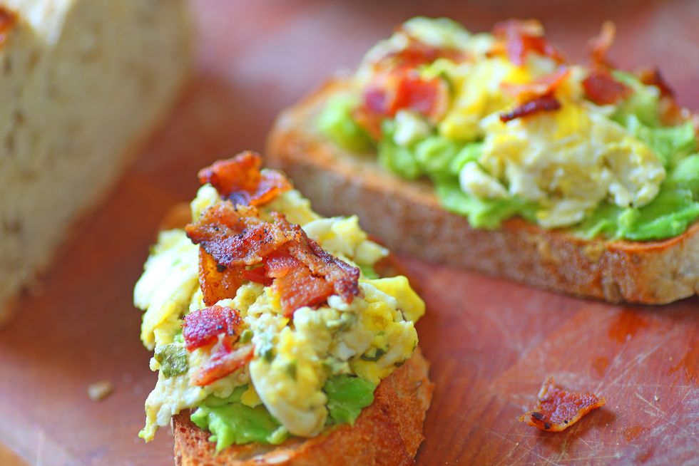 Avocado toast with eggs and bacon