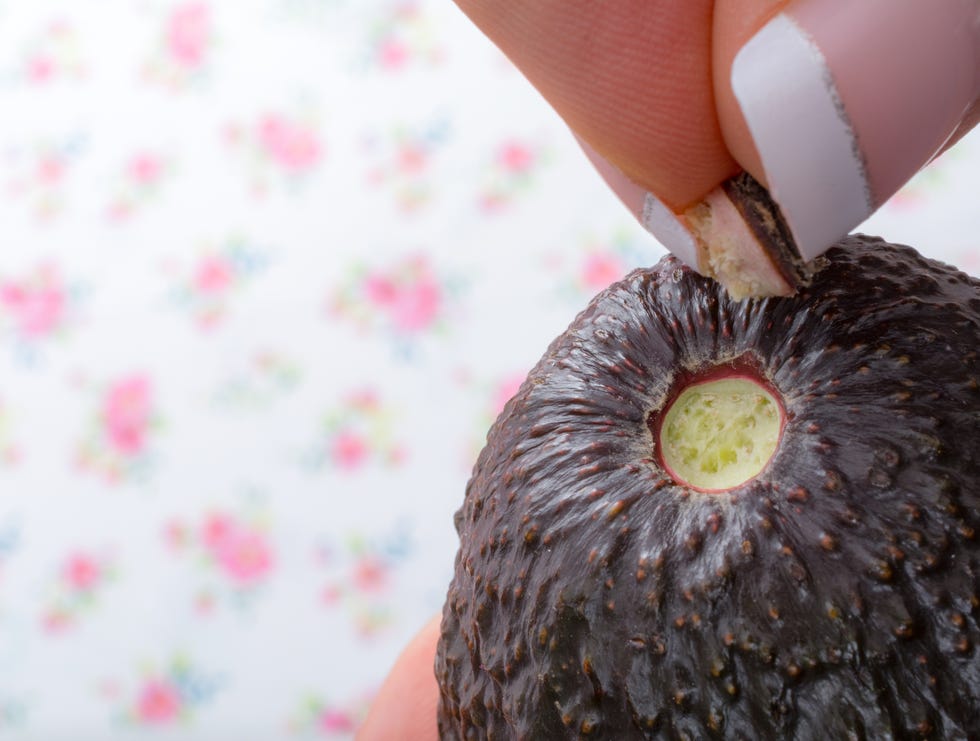 Avocado with opened stem cap