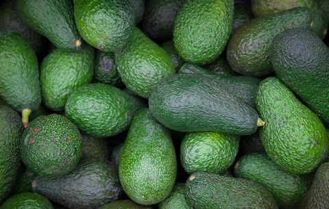 Green whole avocados