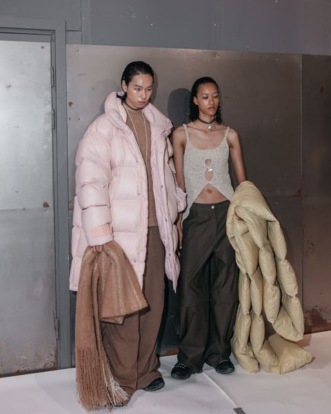 models backstage at holzweiler in a roundup of copenhagen fashion week fall 2023 trends