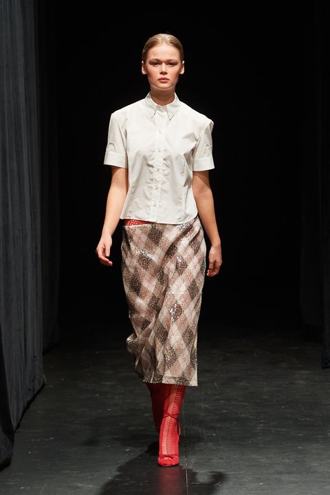 a model wears a sequin skirt in a roundup of copenhagen fashion week trends 2023