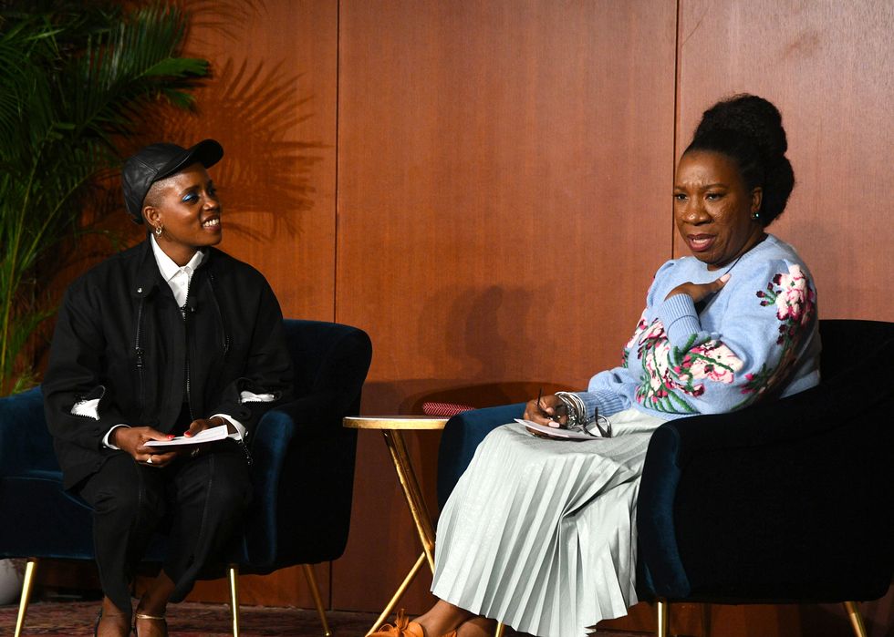 janicza bravo and tarana burke sitting on stage at the meteor and gucci's chime for change global gender equity summit