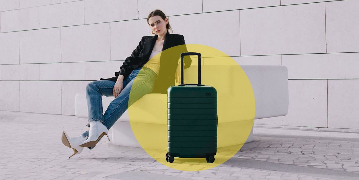Yellow, Baggage, Sitting, Leg, Suitcase, Furniture, Travel, Luggage and bags, Hand luggage, 