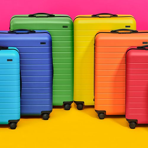 FLOUR SHOP x Away Drop Rainbow-Colored Suitcases