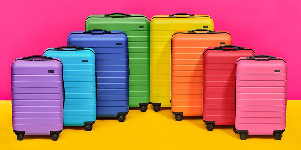 Suitcase, Magenta, Hand luggage, Yellow, Baggage, Material property, Plastic, Luggage and bags, 