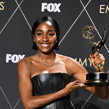 ayo edebiri with her emmy award for best actress