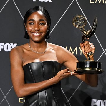 ayo edebiri with her emmy award for best actress