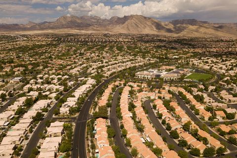 an aerial image shows homes and a golf course in the summerlin community as some homeowner associations remove ornamental grass to conserve water during the western drought on july 20, 2021 from las vegas, nevada   nevada is the first state in the us to ban ornamental grass beginning in 2027 the southern nevada water authority is also providing incentives for residents, golf courses, and other water consumers to reduce their consumption through rebates and incentive programs the lake mead reservoir formed by the hoover dam on the nevada arizona border provides water to the southwest, including nearby las vegas as well as arizona and california, but has remained below full capacity since 1983 due to increased water demand and drought, conditions that are expected to continue photo by patrick t fallon  afp photo by patrick t fallonafp via getty images