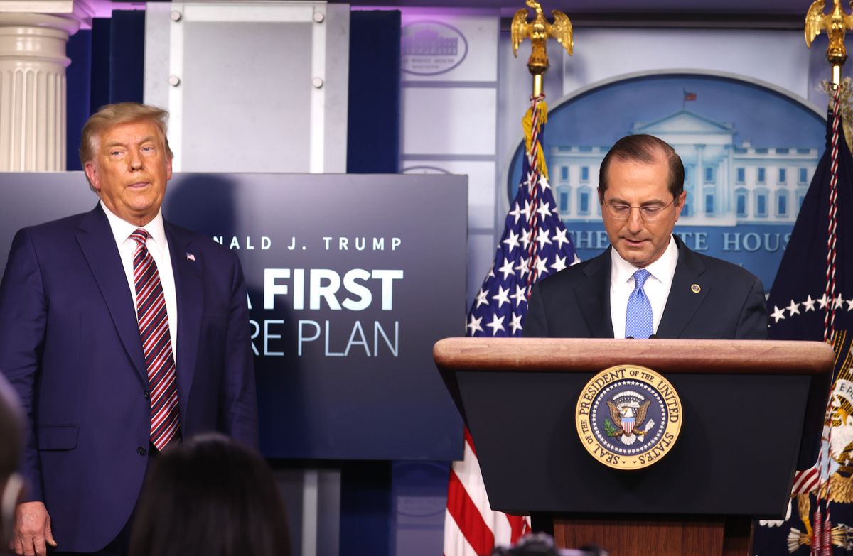 washington, dc   november 20 united states secretary of health and human services alex azar r speaks to the press as us president donald trump looks on in the james brady press briefing room at the white house on november 20, 2020 in washington, dc us president donald trump held his first press conference in over a week to make an announcement on prescription drug prices as he continues to challenge the results of the 2020 presidential election photo by tasos katopodisgetty images