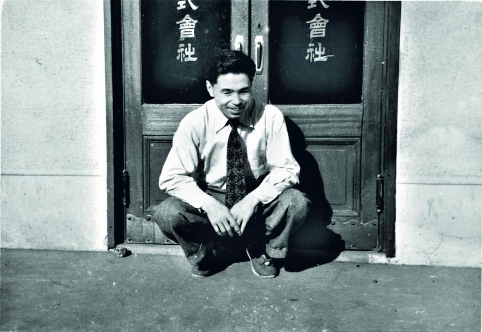 a man sitting on the ground