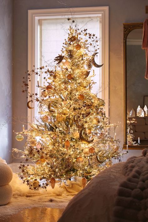 a christmas tree in a room