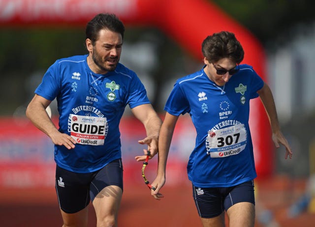 two runners participating in a competitive event