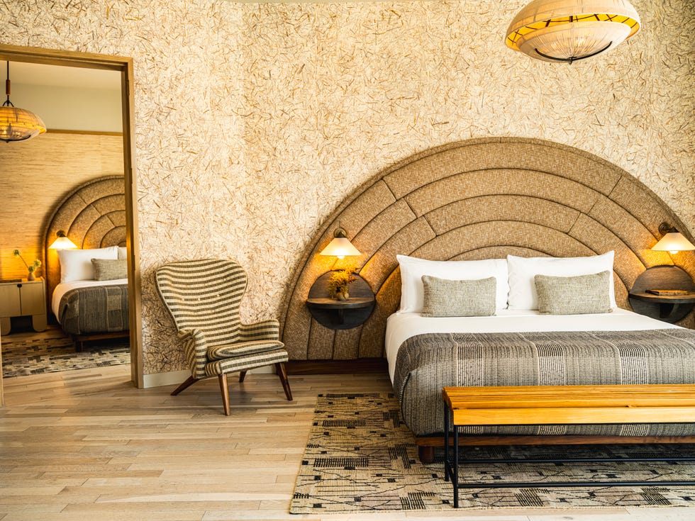 Proper Hotels Santa Monica Stylish hotel room with modern decor and cozy furnishings Proper Hotels Santa Monica Stylish hotel room with modern decor and cozy furnishings