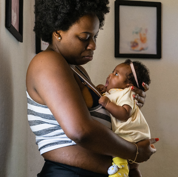 a person holding a baby