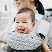 mom with baby carrier