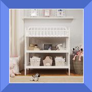 white changing tables in nursery
